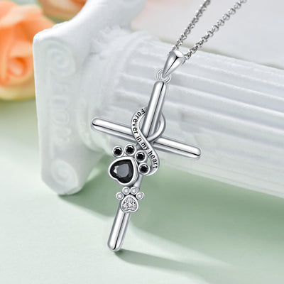 Collier avec pendentif patte et croix en argent